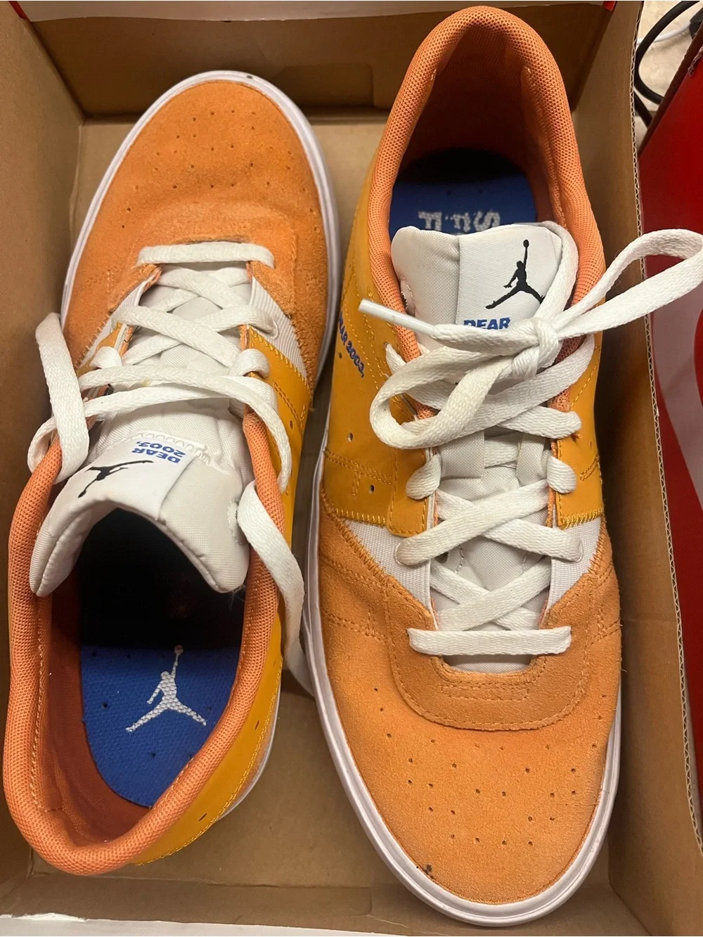 Nike Low-Top Sneakers in Orange and White